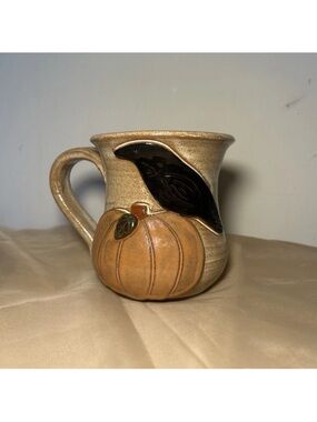 Handmade pottery MudWorks crow and pumpkin mug